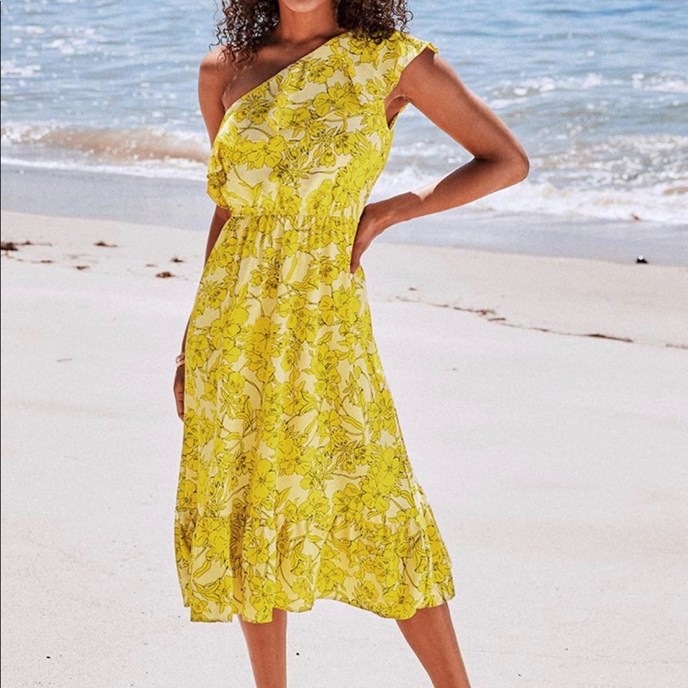 Yellow one shoulder ruffle dress